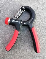 Эспандер кистевой 10-40 кг регулируемая нагрузка красный 997019